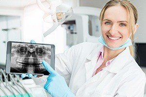 Dentist showing digital x-ray