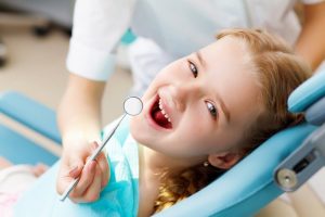 girl smiling dentist