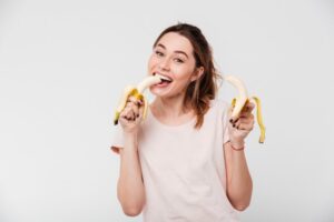 woman eating bananas