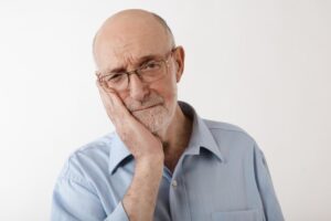 older man experiencing sensitivity